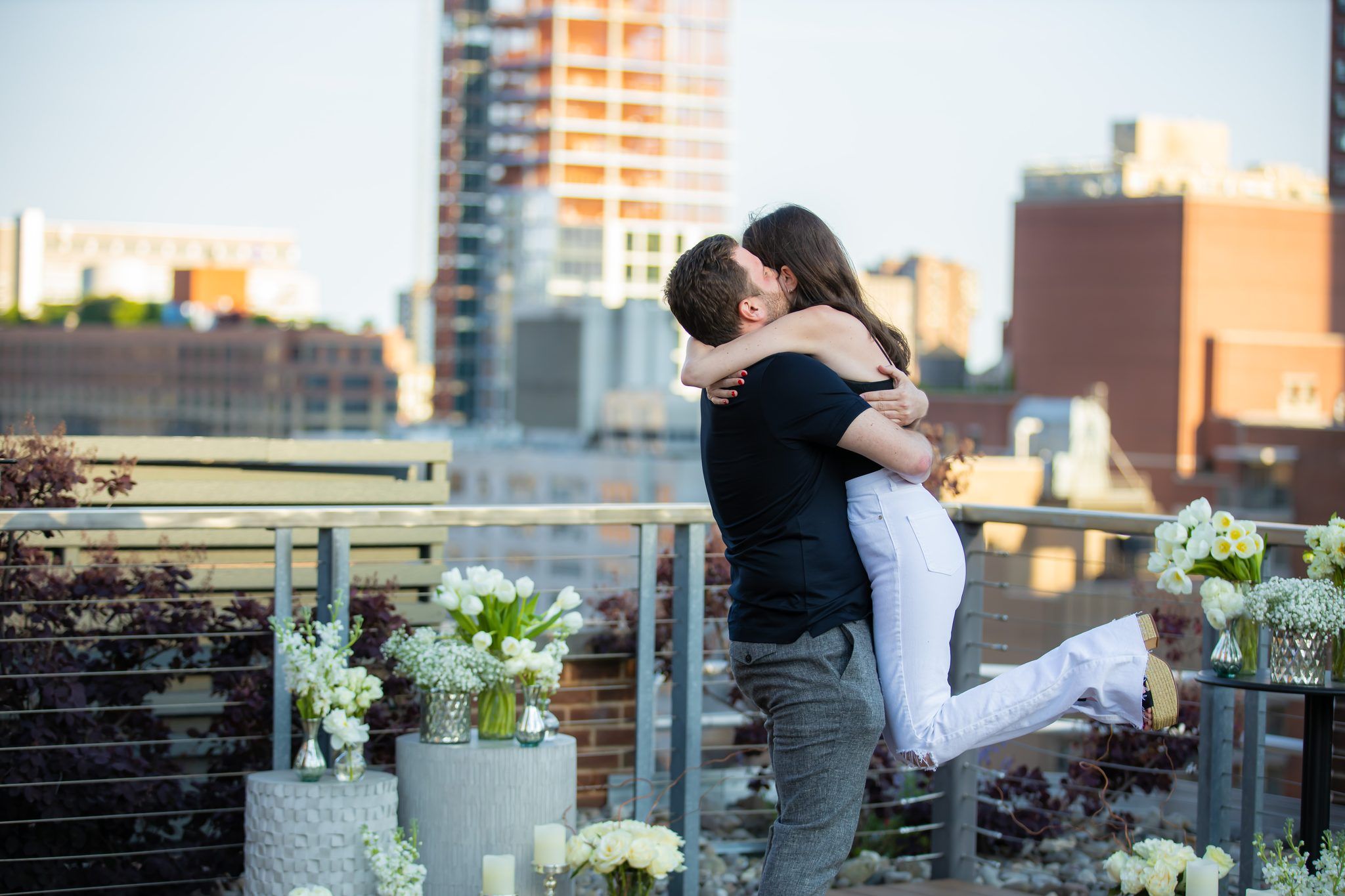 Lift kiss on a rooftop terrace